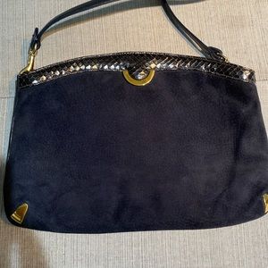 Never used navy suede purse. Black and gold accents